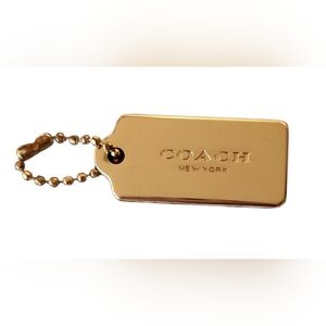 COACH gold-tone Hang Tag